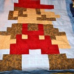 mario_crib_quilt_by_geek_unique